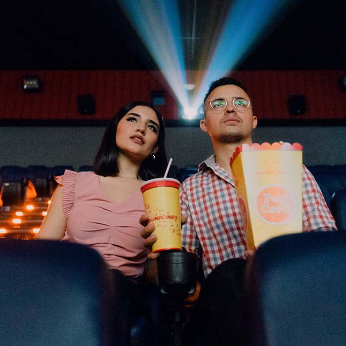 two people watching a movie